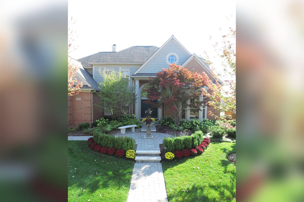 Beautiful house with landscaped front garden.